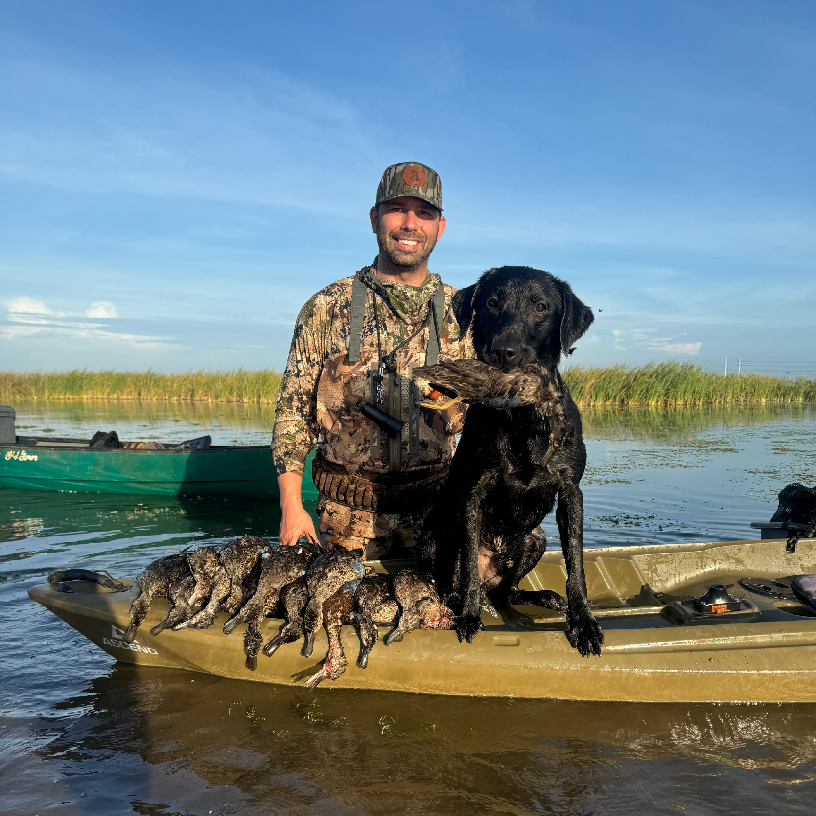 Chris Armanini and his Labrador Retriever